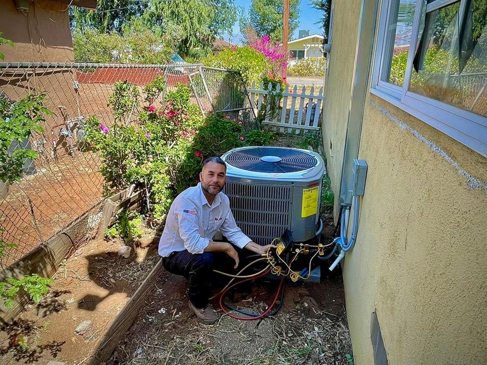 A finished Pon Air condenser installation in a Fontana backyard.